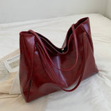 Paula | Glänzende Ledertasche