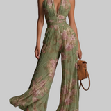 Amelia – plissierter grüner Overall mit Blumenmuster