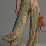 Amelia – plissierter grüner Overall mit Blumenmuster
