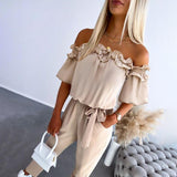 Nikola – Elegante Jumpsuit mit schulterfreien Trägern und Taillengürtel