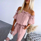 Nikola – Elegante Jumpsuit mit schulterfreien Trägern und Taillengürtel